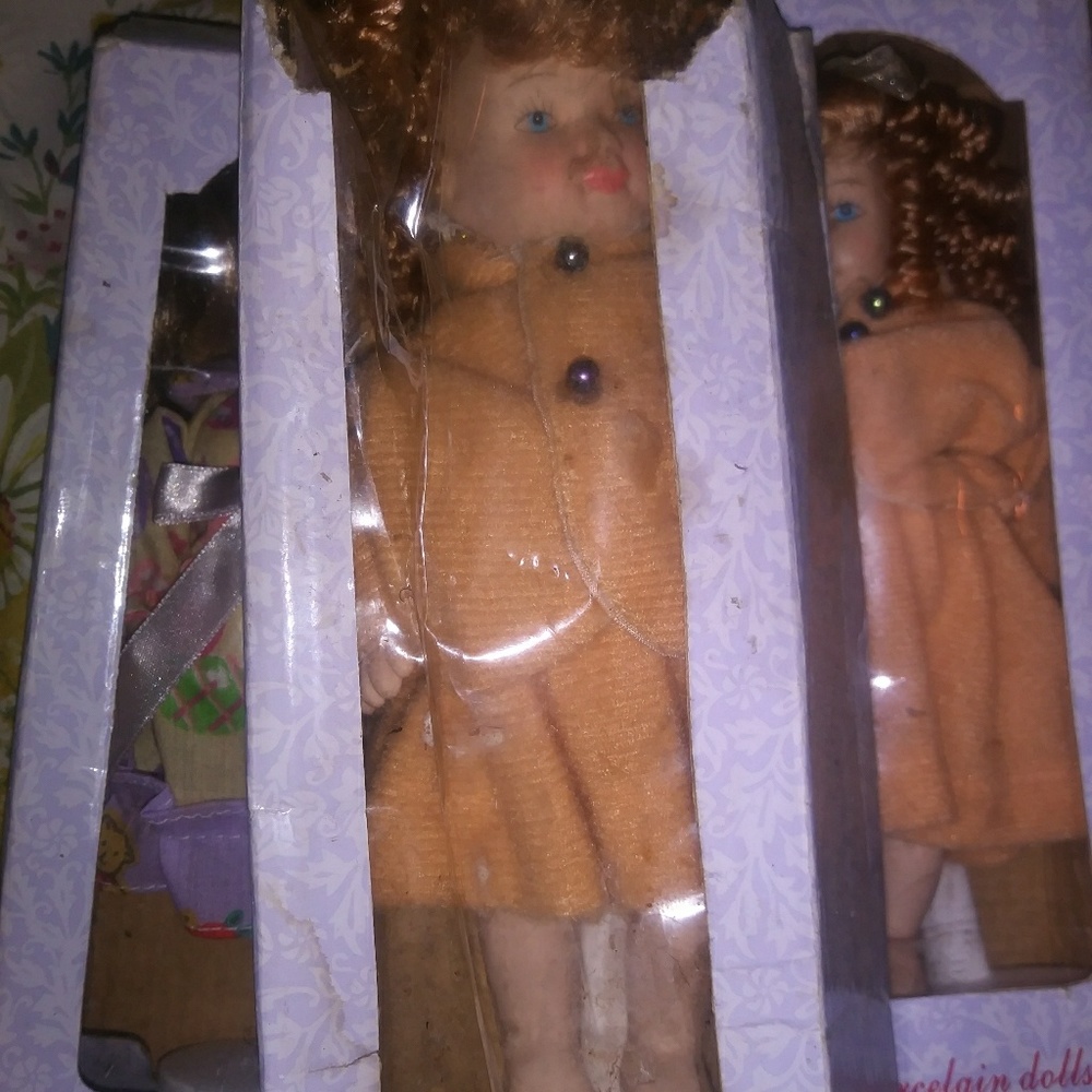 Porcelain Vintage Doll..three of them ..10 each